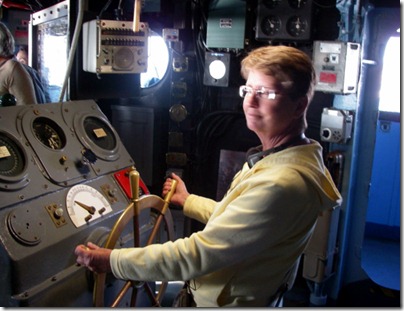 Sandy at the helm in the bridge.