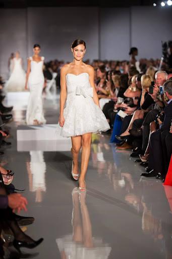 Looking to go short for your ceremony but still look like a bride? Opt for styles that call to the classics in every way other than the length, like this short stunner. Looking to go short for your ceremony but still look like a bride? Opt for styles that call to the classics in every way other than the length, like this short stunner.