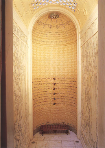 An innovative lighting technique above the shower here - an open-work screen known as a 'claustra.'
