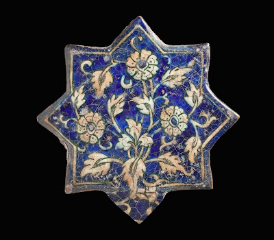Tile | Origin: Greater Iran | Period: mid-15th century | Collection: The Madina Collection of Islamic Art, gift of Camilla Chandler Frost (M.2002.1.260) | Type: Ceramic; Architectural element, Fritware, molded and underglaze-painted, Point to point: 8 3/8 in. (21.27 cm)