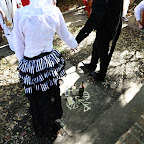 Alex and Lisa hold hands during the ceremony. Alex and Lisa hold hands during the ceremony.