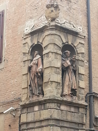 Statue Adornments on Wall