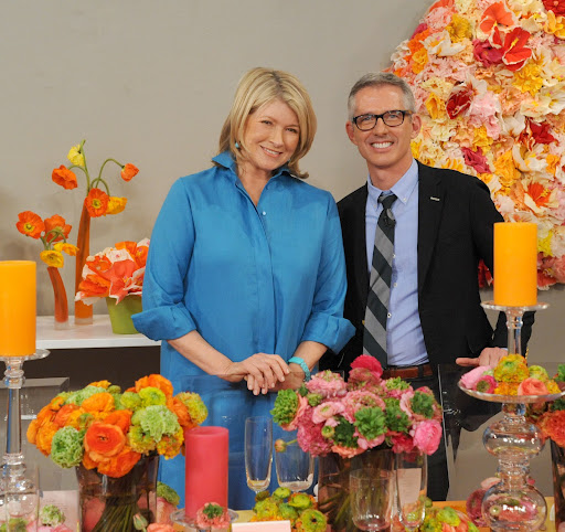 Martha and Bryan Rafanelli with the gorgeous table that he designed.