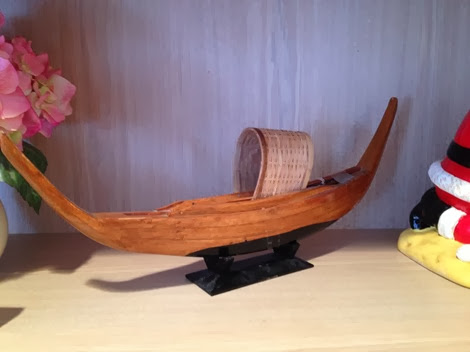 c0 Clarence's Shelf - Carved boat from Africa