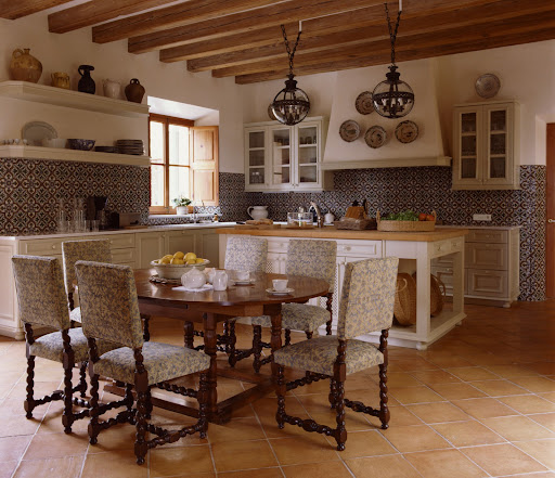 The Moroccan tiling on the walls makes this room adds a layer of pattern. (photo by Simon Upton for The World of Interiors)