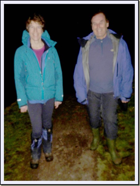 Sue and Andrew rush along the Bridgewater Canal towpath at night