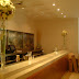 Tall vases with topiary balled displays.jpg
