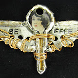 SOLDBe Free SOLD 
Recycled Metal Pendant