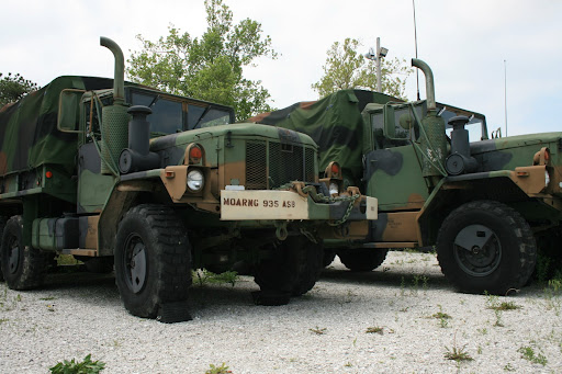 Trucks bearing the 935th Aviation Support Battalion marking.