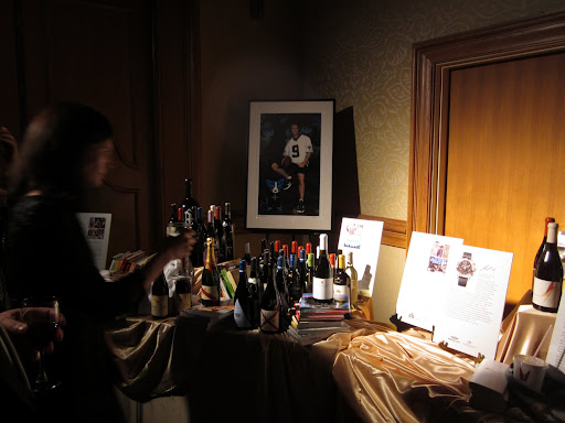 The hallway was lined with silent and live auction packages for bidders to inspect, with items ranging from Saints tickets or jewelry to custom blended wines or a vacation with Chef Emeril.