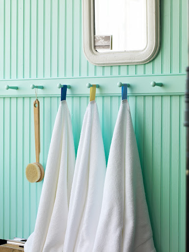 A Shaker peg rail is also good for holding multiple towels in a bathroom.