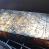 Salt block, heating on the grill before searing the striped bass & veggies