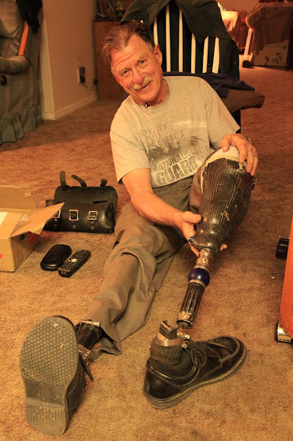 Dave Barr repaing his titaniom foot.jpg