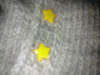 Yellow Star Buttons Closeup of wraplan showing the tiny yellow star buttons