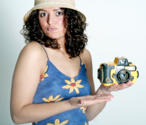 [woman%2520sells%2520camera%2520500x430%2520Photoxpress_1293132%255B3%255D.jpg]