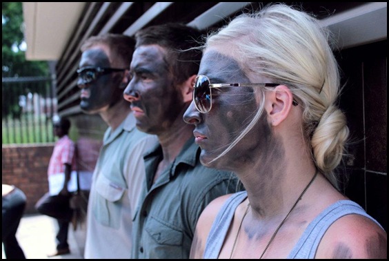 AFRIKAANS matriculants paint themselves black in protest against their top-performers being denied places at Afrikaans Universities for purely racist reasons