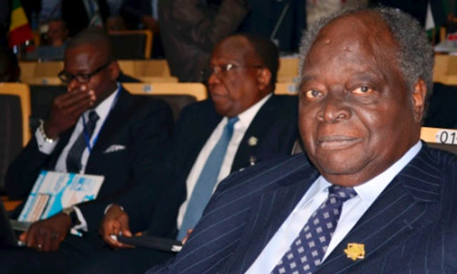 Kenya's President Mwai Kibaki attends the opening ceremony of the 20th Ordinary Session of the Assembly of Heads of State and Governments at the African Union headquarters in the Ethiopian capital Addis Ababa on 27 January 2013. President Kibaki rejected a law that would have created a Kenya Climate Change Authority in January 2013. Photo: Tiksa Negeri / REUTERS