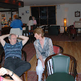 Relaxing after all the exertions - the winning Captain, Michael O'Halloran, explains the secret of his success to Una.