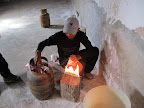 Start of the Salt Flats tour - first stop, a salt packaging plant. This guy is sealing the packets of salt.