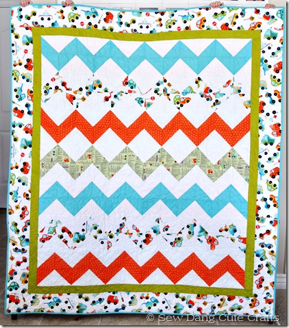 Girls-holding-finished-quilt