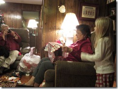 Mom opening gift from Dat