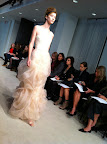 I also love this mermaid gown with a cut blossom skirt with tulle overlay.