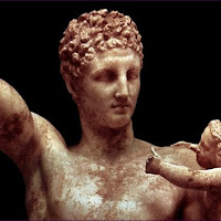 54.- Praxíteles. Hermes con el niño Dionisios