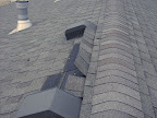 More shingles that were ripped or crached. This view is facing north.