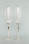 The couple toasted with these Martha Stewart Collection Toasting Flutes.
