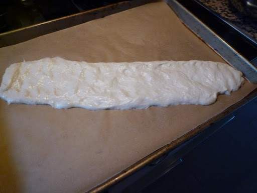 Dough stretched out and ready for topping.