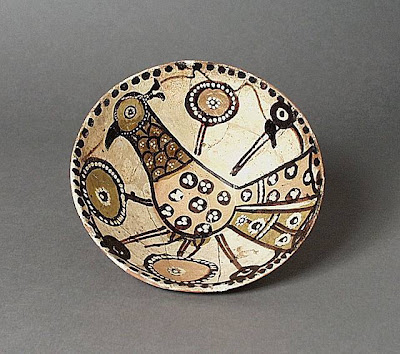 Bowl Iran Bowl, 11th century Ceramic; Vessel, Earthenware, underglaze slip-painted, 2 1/2 x 6 7/8 in. (6.35 x 17.46 cm) The Nasli M. Heeramaneck Collection, gift of Joan Palevsky (M.73.5.144) Art of the Middle East: Islamic Department.