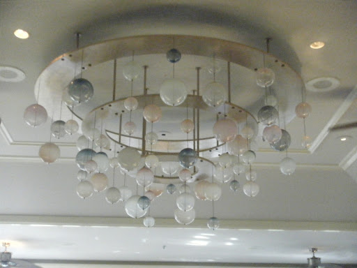 Neve, another restaurant at the resort, has a clean, modern feel that'd be marvelous for a rehearsal dinner. Just check out this striking lighting feature.