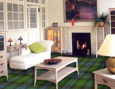 The colors used in this plaid rug are unique and attention-grabbing (Mackenzie tartan Stevens & Graham).
