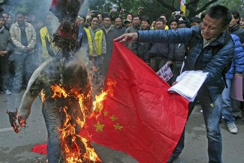 [reuters_new_delhi_tibetan_protester_480_17jan2012%255B2%255D.jpg]