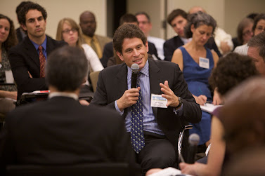 Adam Weinstein, President and CEO of the Phipps Houses Group and Chairman of the Phipps Community Development Corporation, talks at a briefing on affordable housing hosted by Accenture and RCLA.  Photo: Sam Hollenshead