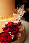 The flowers and feathers on our The People's Cake cake were handmade from sugar. The flowers and feathers on our The People's Cake cake were handmade from sugar.