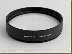 250d close up lens screws onto the front element of a standard lens
