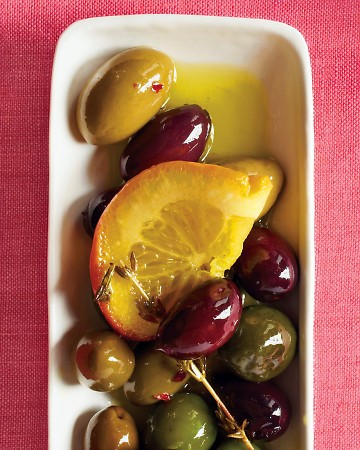Marinated Olives: Jazz up purchased olives with citrus slices and fresh herbs for an easy New Year's appetizer. Marinated Olives: Jazz up purchased olives with citrus slices and fresh herbs for an easy New Year's appetizer.