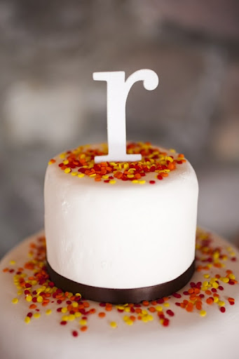The top is decorated with confectioners' sprinkles. I painstakingly removed the colors I didn't like from the mix, but the final look made it totally worth it.