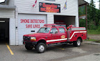 Wild Fire # 1 - Bush Truck, A 1994 Ford 4 x 4 crew cab, 250 imp gal tank and 18 hp pump. This truck was purchased with funds made by Clearwater Members fighting the Wild Fires of 2003