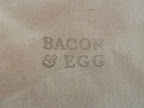 At the end of the night, as guests boarded the buses back to town, they were given breakfast sandwiches packed in muslin bags. Each was rubber stamped with the type of sandwich inside.