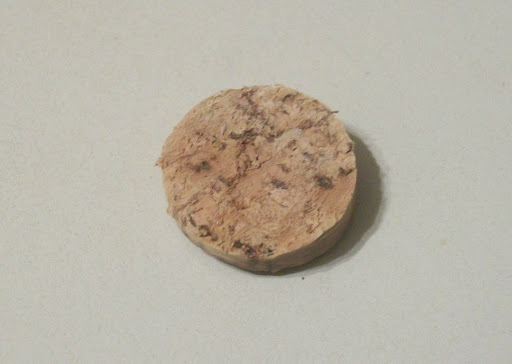 You want to cut thin cork circles.