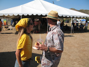 Kathleen and Bill Powers with "Save Anza Borrego" bumper stickers in hand.