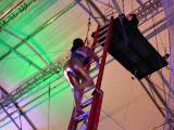 And climbs up the 30 foot ladder to the platform.