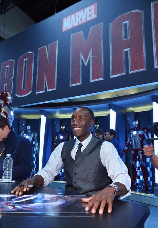 SAN DIEGO, CA - JULY 14:  Actor Don Cheadle signs autographs for "Iron Man 3" with Marvel Studios during Comic-Con International 2012 at San Diego Convention Center on July 14, 2012 in San Diego, California.  (Photo by Alberto E. Rodriguez/WireImage) *** Local Caption *** Don Cheadle