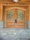 Entry doors, copper with beveled glue chip glass and peach beveled accents.