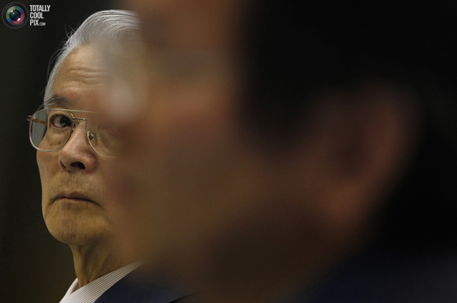 Tokyo Electric Power Company, Inc. (TEPCO) Chairman Tsunehisa Katsumata (L) is seen beside the company officials during a news conference at the company head office in Tokyo April 17, 2011. Japanese nuclear power plant operator TEPCO hopes it will be able to achieve cold shutdown of its crippled Fukushima Daiichi nuclear plant within six to nine months, the company said on Sunday. Katsumata said he was considering resigning over the accident, but that he couldn't say when. REUTERS / Issei Kato / totallycoolpix.com