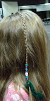 feathers & beads on a braid
