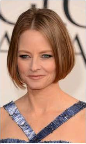 Jodie Foster's gunmetal eye makeup (it matched her dress!) was striking. Makeup artist Rachel Goodwin used Chanel Long-Lasting Eyeliner in Marine, then diffused it with a smudge brush. She paired it with Chanel Soft Touch Eyeshadow in Black Star, blending the color into the crease. Photo courtesy of Chanel.