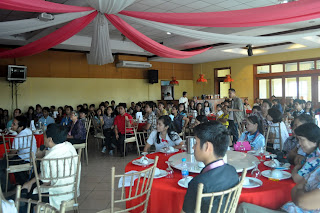 Audience in a Spacious Hall